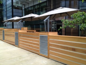 Three large Toscana umbrellas